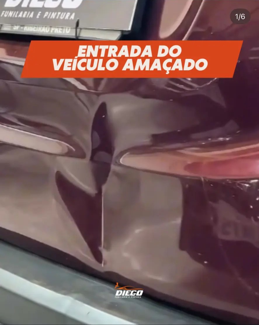 Entrada do veículo amassado na oficina